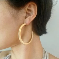 Ellison + Young Jewelry Gold Dipped Brass Hoop Earrings